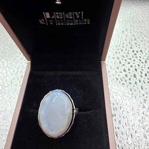 rainbow moonstone ring features a large oval gemstone set in a sterling silver
